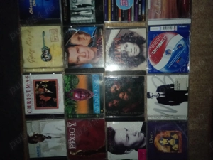 lot 100buc cd uri cu muzica disco.pop.contry