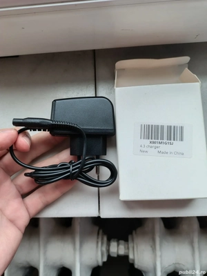 Incarcator masina tuns Philips INPUT:100-240V-0.3A 50 60Hz OUTPUT:4.3V-70mA