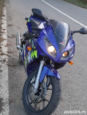 vând motor 125 Yamaha