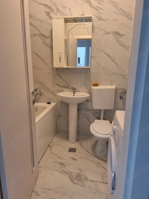 proprietar inchiriez garsoniera cu loc de parcare inclus