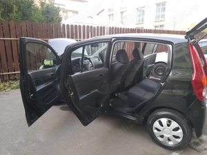 Daihatsu Cuore 2009 - imagine 6