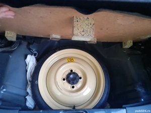 Daihatsu Cuore 2009 - imagine 5