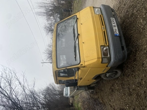 Nissan Trade100 basculabil