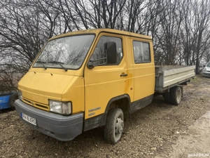 Nissan Trade100 basculabil - imagine 2