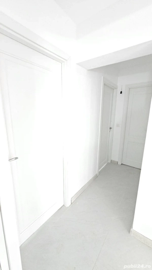 102mp din care: 54 mp este livingul iar 48 mp doua dormitoare si cele doua bai. Pret 119.900 Euro - imagine 7