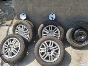 Vand jante de aliaj Dacia Logan si roata de rezerva din tabla - imagine 4