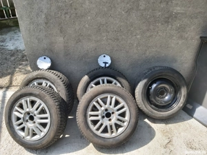 Vand jante de aliaj Dacia Logan si roata de rezerva din tabla - imagine 2