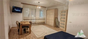 Apartament 2 camere, mobilat utilat cu  toate utilitatile, pe strada pricipala, in Cartierul Militar