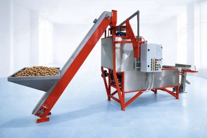 Linie compactă pentru spart nuci și separarea miezului