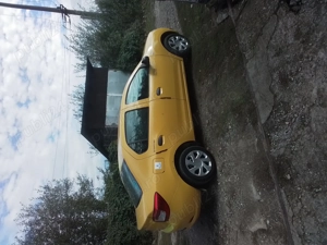 Dacia Logan 1.2 16v primul proprietar, GPL și galben de fabrică  - imagine 4