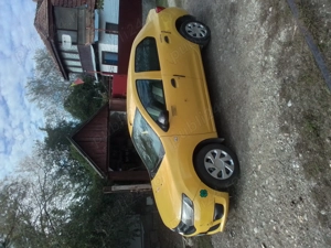 Dacia Logan 1.2 16v primul proprietar, GPL și galben de fabrică  - imagine 5