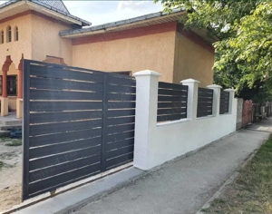 executam garduri si porti 