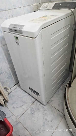 Electrolux cu încărcare verticală