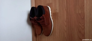 Vind ghete Timberland noi.