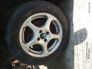 4 jante originale Renault pe 15 cu anvelope de vara pentru Renault și Logan  - imagine 2