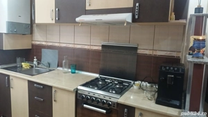 Vând mobilă bucătărie făcută pe comandă,aragaz , hotă 