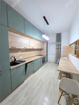 Apartament cu 3 camere decoamndate curte si terasa in zona Selimbar - imagine 6