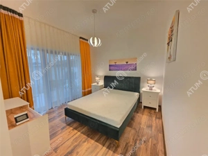Apartament cu 3 camere decoamndate curte si terasa in zona Selimbar - imagine 4