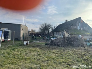 vand teren cu casa la cornesti 