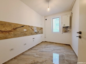 Bucatarie inchisa. Finisat la cheie. Incalzire in pardosela.