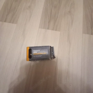 perie timberland si aparat foto pret afisat 