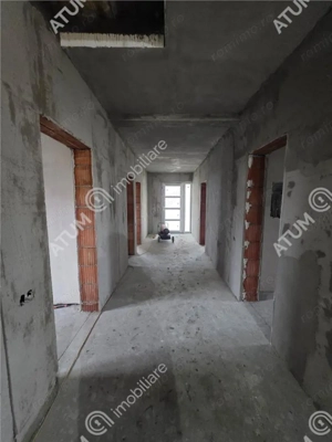 Casa individuala cu 4 camere si curte libera de 340 mp in Cisnadie - imagine 6