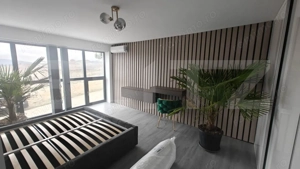 Apartament modern tip loft în Cordău – design contemporan, spațiu și lumină - imagine 10