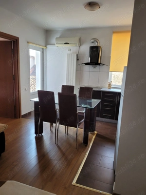 Închiriez apartament cu două camere  - imagine 2