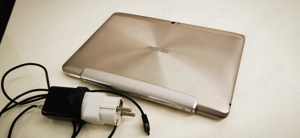 Vand  Asus Transformer Pad cu o fisura subtire pe ecran dar functional.