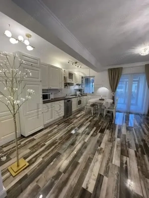 Apartament in casa insiruita - zona buna - mobilat utilat - curte amenjata