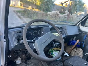 nissan trade 100 - imagine 4