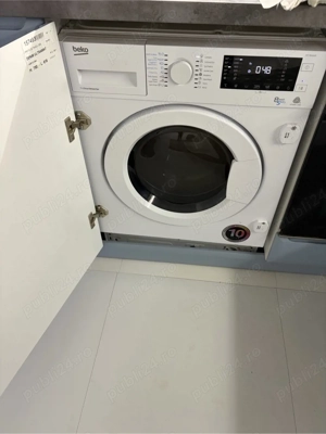 Masina spalat rufe cu uscator Beko