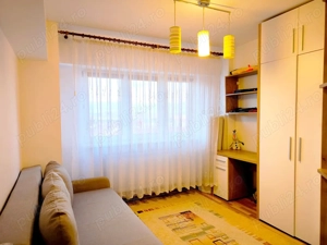 Apartament cu două camere, loc de parcare, Răcădău.