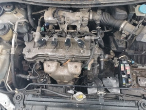 Dezmembrez nissan primera 16i  - imagine 3