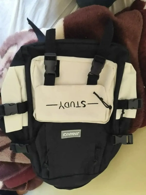 Ghiozdan de vânzare 