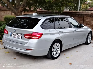 BMW 318D Touring  - imagine 8