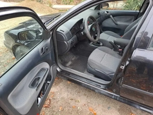 Skoda Octavia 1.6 Benzină - 151.919 km - imagine 3