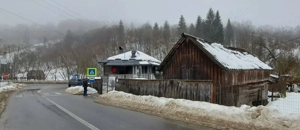 Casa, anexe si teren agricol.