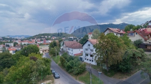 Apartament cu 3 camere in casa, curte proprie si garaj