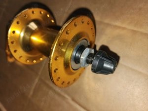 Vând butuc auriu pt. roată față licicletă cu prindere disc, pt. 36 spițe