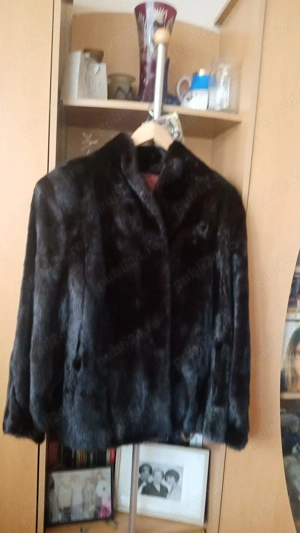 Adaug la anunțul cu haina de vizon telefonul la care răspund  .