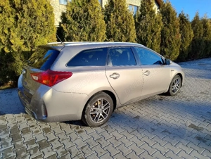 Toyota Auris hibrid an 2014 - imagine 4