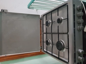Vand aragaz in perfecta stare de functionare cuptorul functioneaza atat electric cat si pe gaz