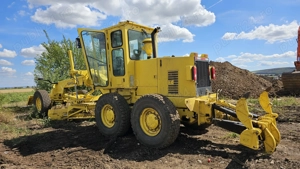 Greder New Holland F106.6 6x4 cu scarificator - imagine 6