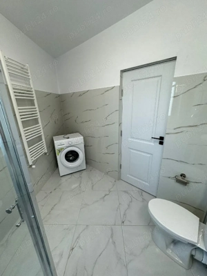 Inchiriez apartament in bloc nou, luminos cu 3 camere (2 dormitoare+living) decomandate str oasului  - imagine 9