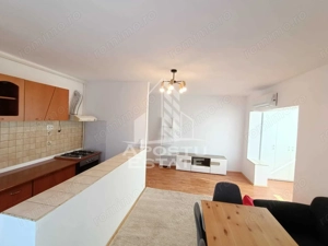 Apartament cu 2 camere, etajul 2 , centrala proprie, zona Dambovita