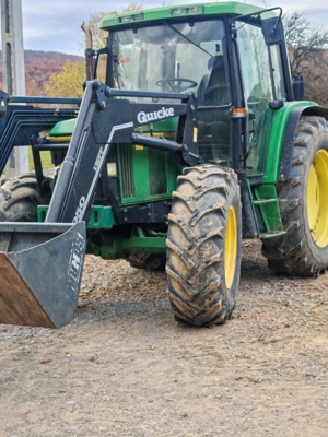Tractor John Deere model 6400 cu încărcător frontal cupa cereale cupa pentru paleți și compresor de 