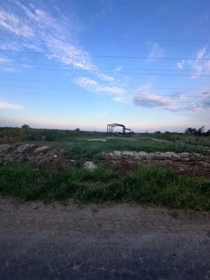 Vand teren intravilan 2000 mp, deschidere DJ602, constructie hala începuta