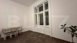 Apartament ultracentral cu o cameră, terasa de 38mp și balcon 3mp 