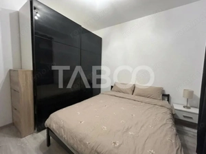 Apartament 3 camere utilat si mobilat cu balcon si parcare privata 